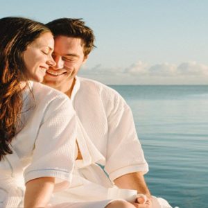 Beach Weddings Abroad Mauritius Weddings Couple Relaxing By Ocean2