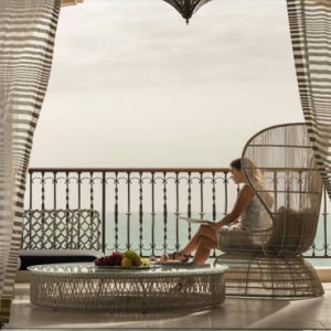 Beach Weddings Abroad Dubai Weddings Woman On Balcony In Suite