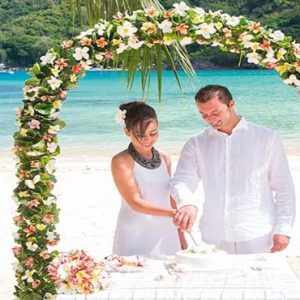 Beach Weddings Abroad Seychelles Weddings Couple Beach Wedding Cutting Cake