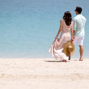 Beach Weddings Abroad Dubai Weddings Couples Romantic Stroll On Beach